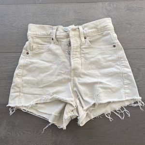 Cream cut off shorts